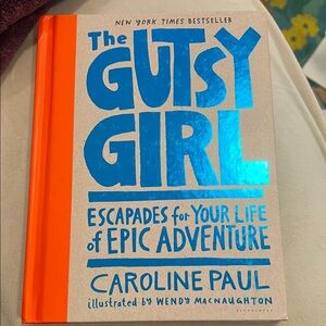 The Gutsy Girl Book with Orange and Blue Cover hard cover